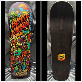 vibrant skateboard art depicting a wolf looking creature eating a fish while wearing sunglasses. Electric Colors