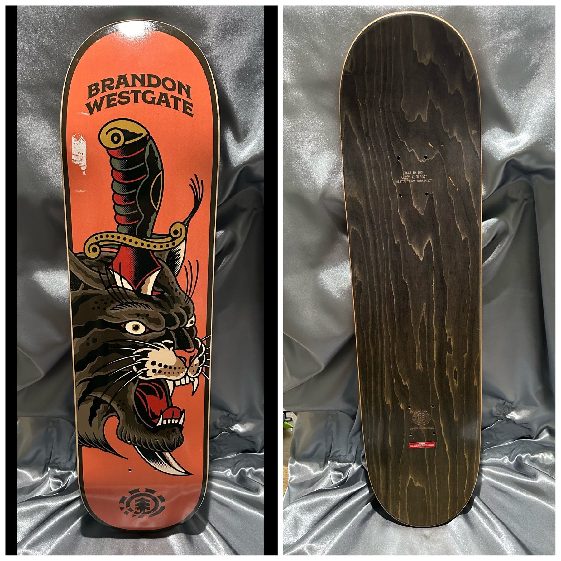 Tattoo flash art style art on skateboard deck depicting a black panther with a knife through the skull. 