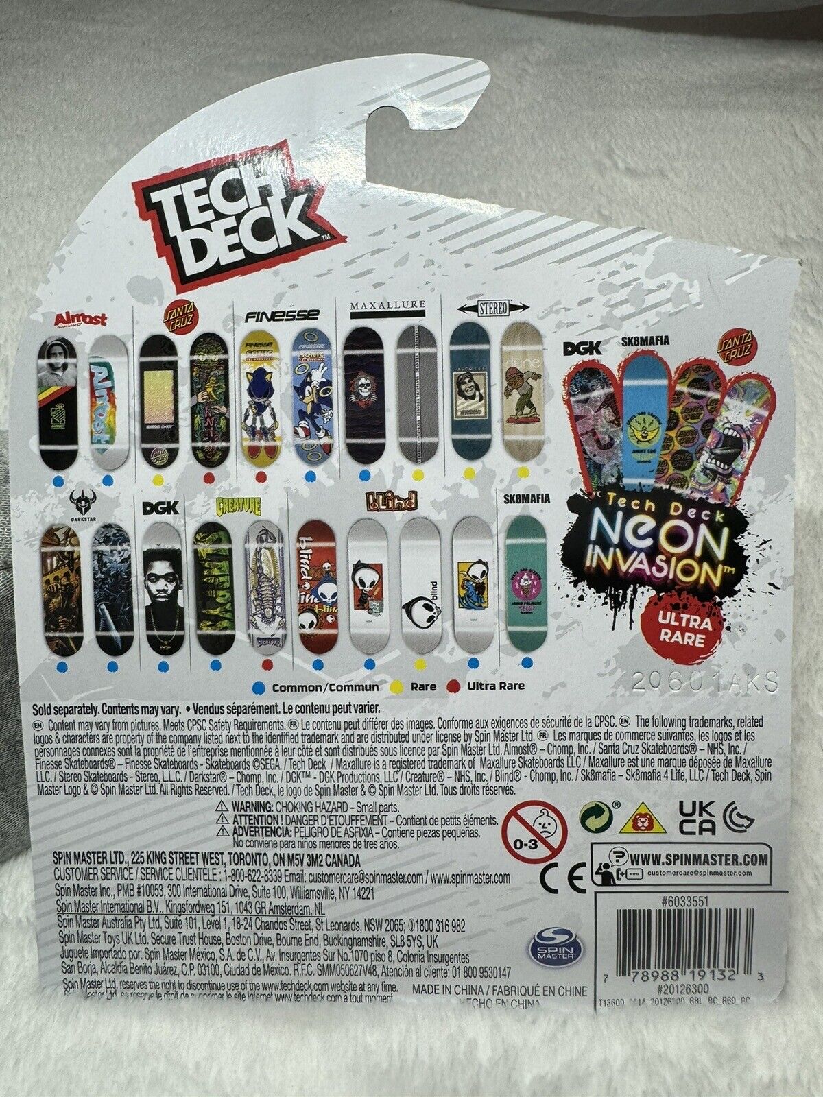 Reverse side of tech deck packaging for DGK Skateboards Neon Invasion